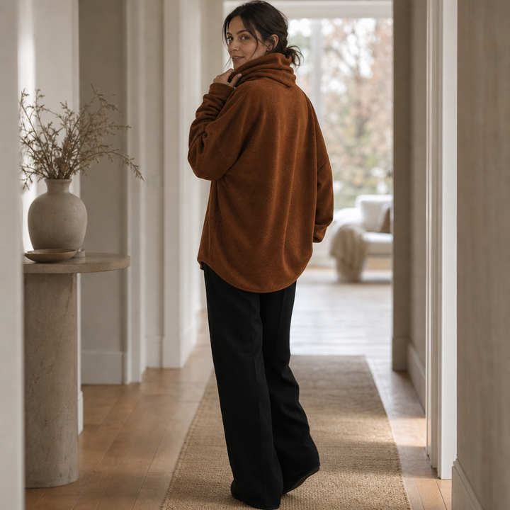 Stilren oversized tröja för dam matchad med vardagsbyxor