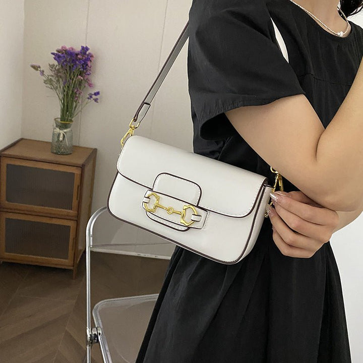 Rosa minimalistisk damhandväska i elegant design för vardag och fest