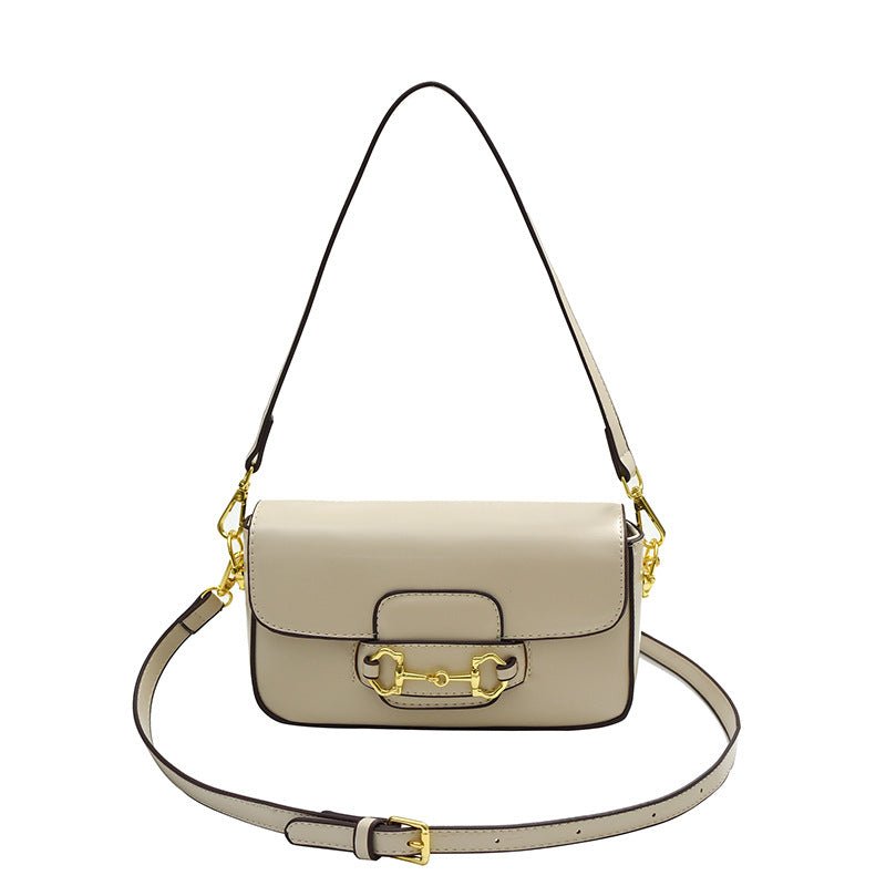 Beige Lina minimalistisk handväska med guldfärgade detaljer