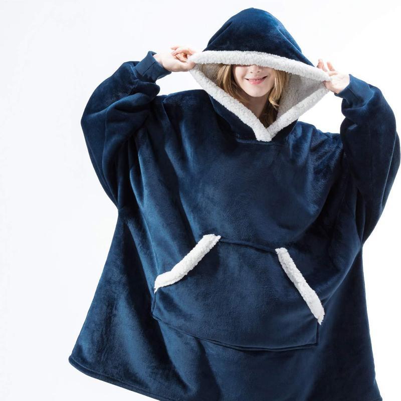 "Lös och mysig hoodie för dam och herr med stor ficka, rymlig huva och flera färgalternativ för maximal komfort."