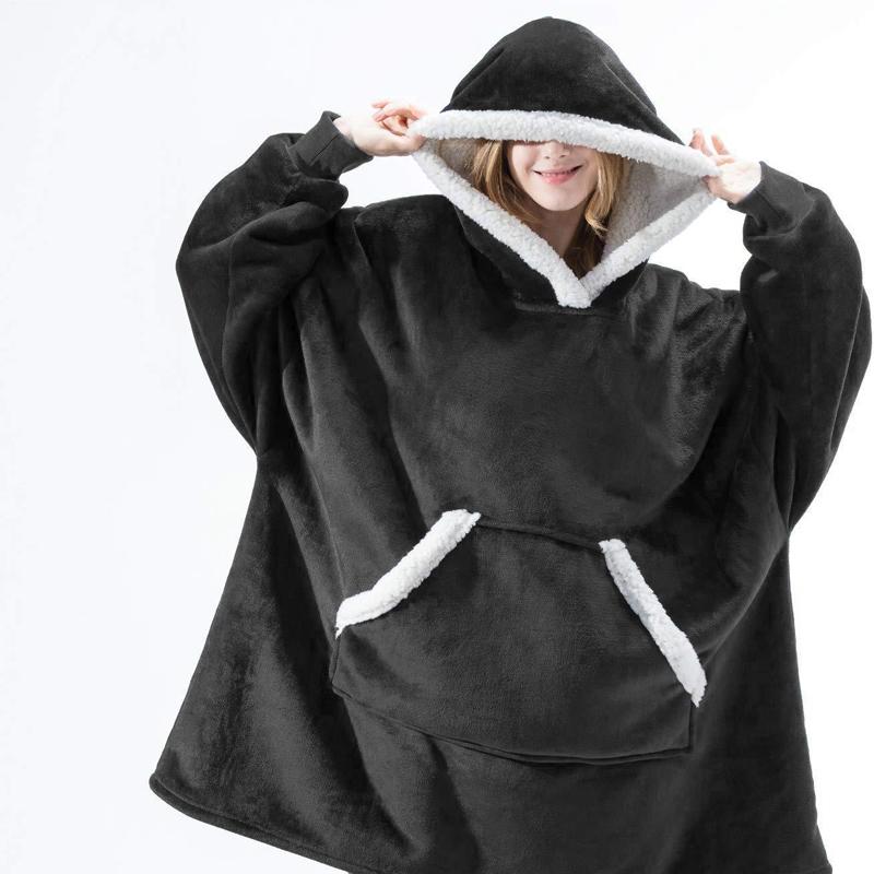 Lös och mysig hoodie för dam och herr med stor ficka, rymlig huva och flera färgalternativ för maximal komfort.
