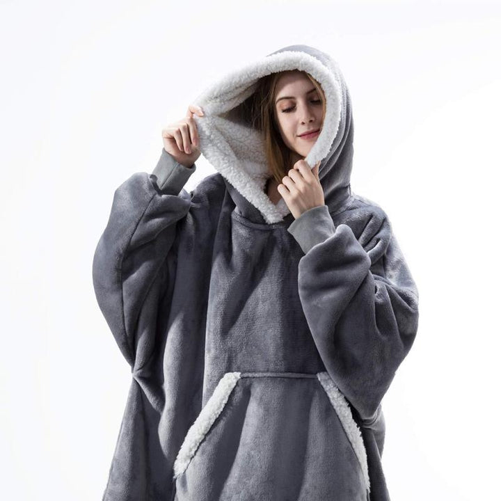 Lös och mysig hoodie för dam och herr med stor ficka, rymlig huva och flera färgalternativ för maximal komfort.