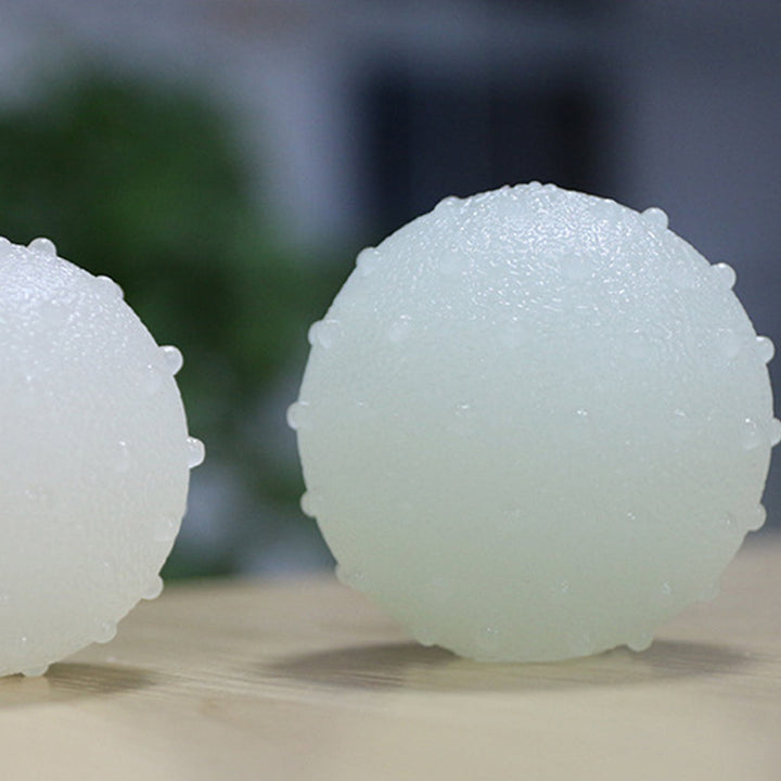 Aktiverande hundleksak: Lysande boll av naturgummi för lek i mörker, en hållbar tuggleksak för valpar.