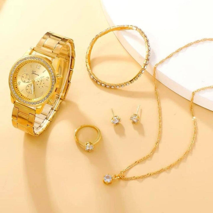 Komplett smyckeset och damklocka i guld med strass, perfekt som presenttips.