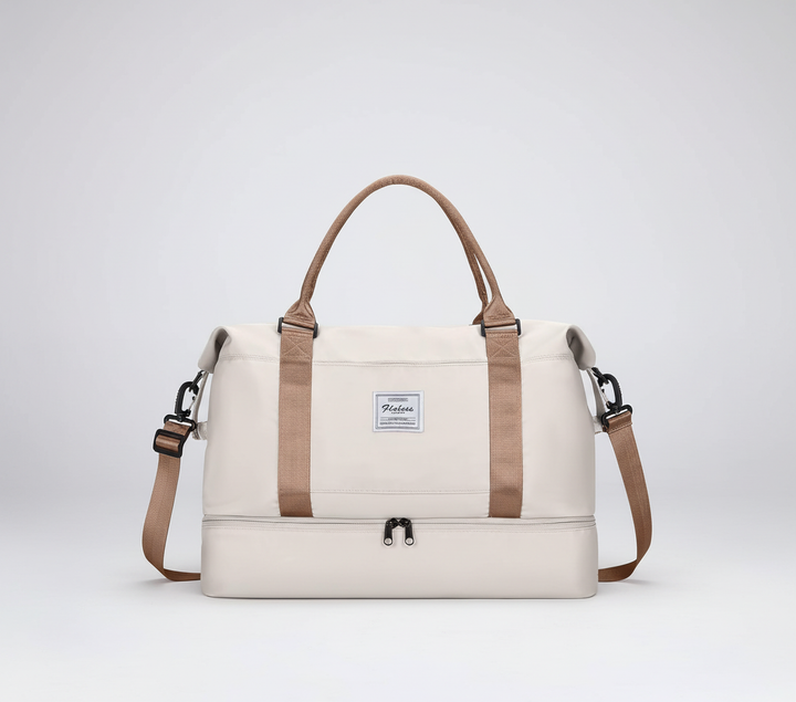 Elegant Travelista weekendväska med smarta fack, idealisk för kortare resor & packning.