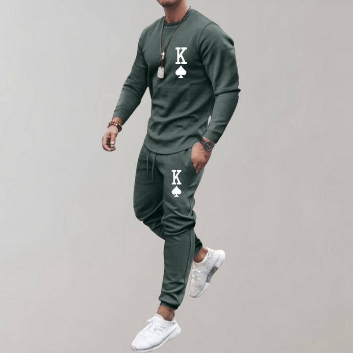 Modern herrträningsdräkt för sportiga män. Stilren activewear set för både träning och avkoppling.