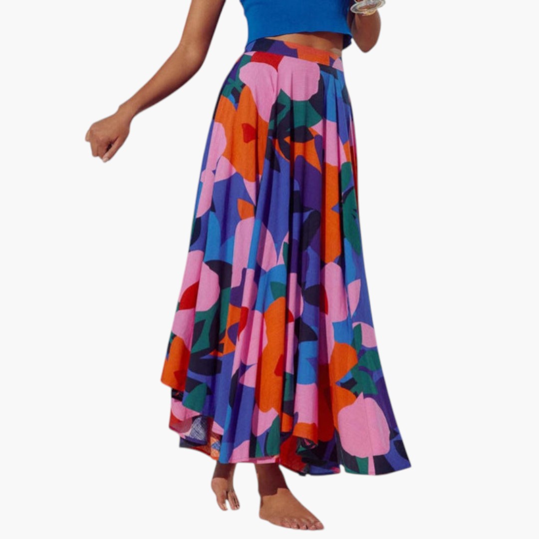 Lång, elegant damkjol med unikt tryckt mönster och elastisk midja. En mångsidig sommarkjol i maxilängd för kvinnor.