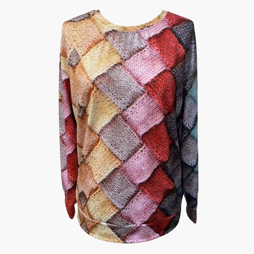 Elegant stickad damtröja, mönstrad med långa ärmar. Bekväm pullover för kvinnor, stilren och färgstark.