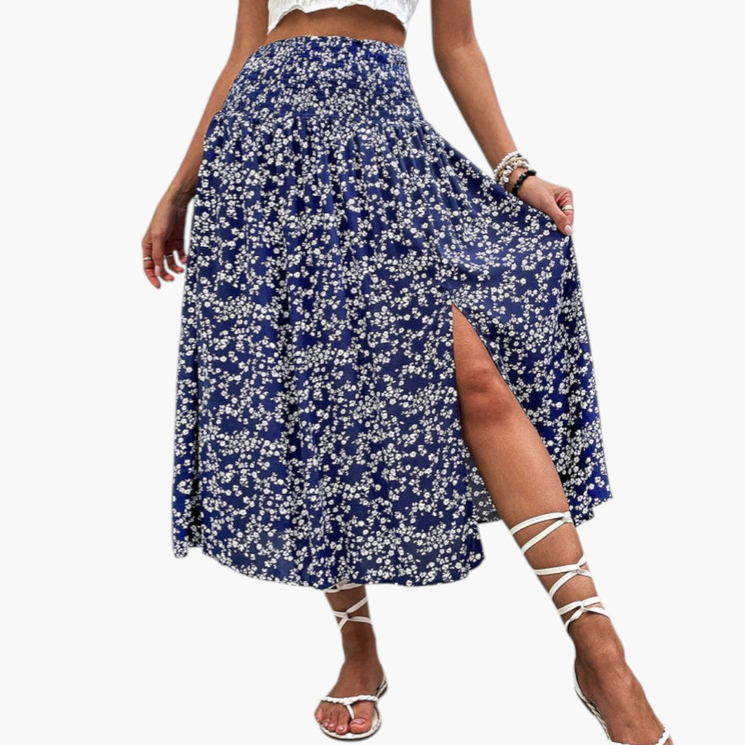 Mörkblå blommig maxikjol för kvinnor med hög midja, elegant sidoflik och A-linje. Perfekt sommarkjol.