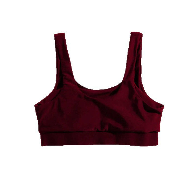 Mjuk och stödjande mörkröd sport-bh crop top för dam, utformad för maximal komfort under träning.