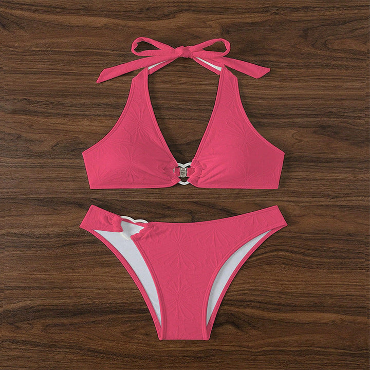 Justerbar damtriangelbikini i magenta och vitt med hjärtdekoration. Komfortabla badkläder för strand och sommar.