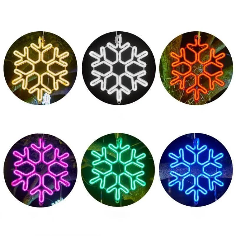 Närbild på upplyst LED-snöflinga för julbelysning med varmt sken