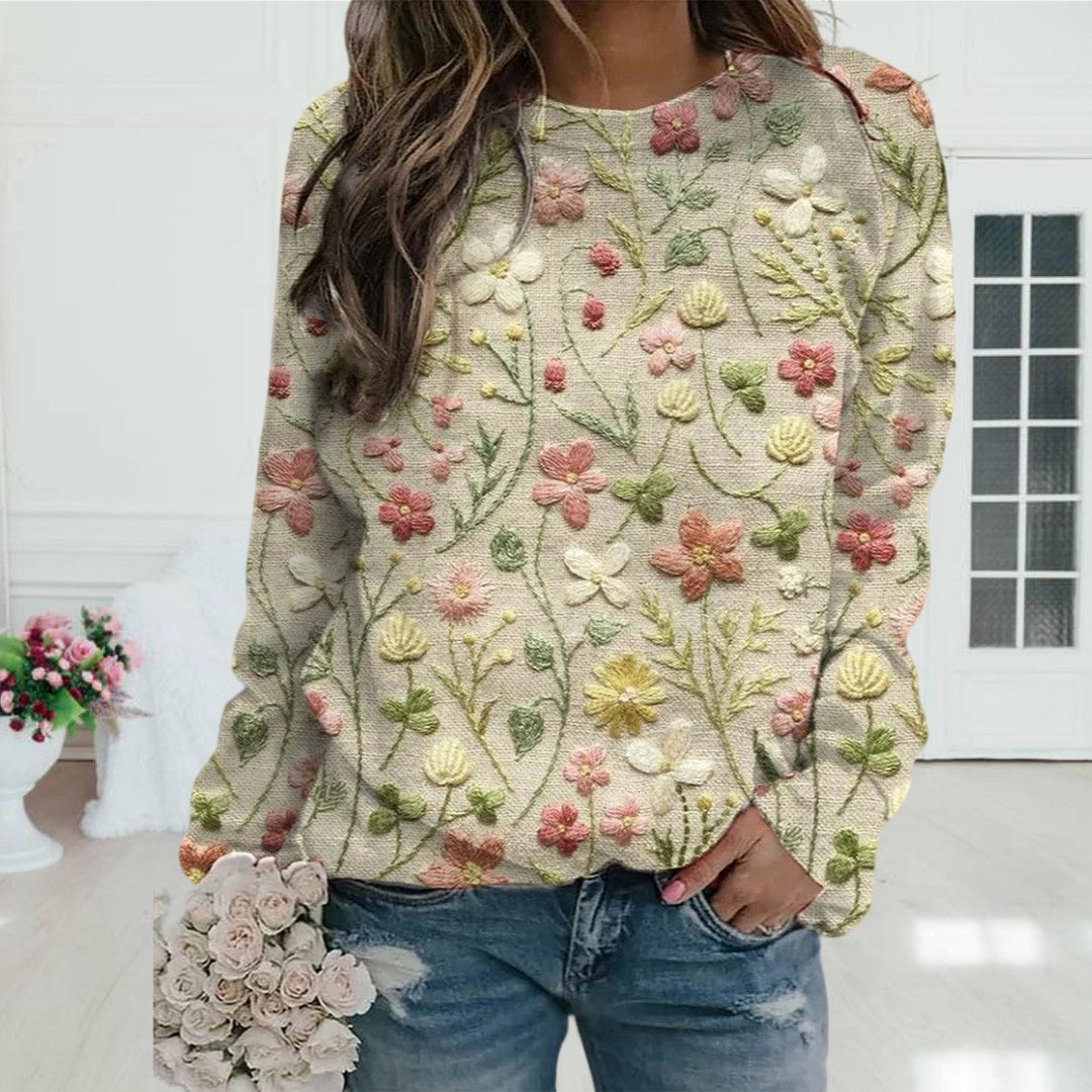 Damtröja med blommönster och broderi i beige färg framifrån