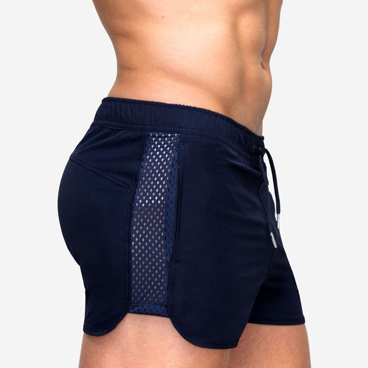 "Mäns andningsbara sommarmesh shorts i flera färger, lätt meshmaterial, två fickor, ideal för strand och träning."