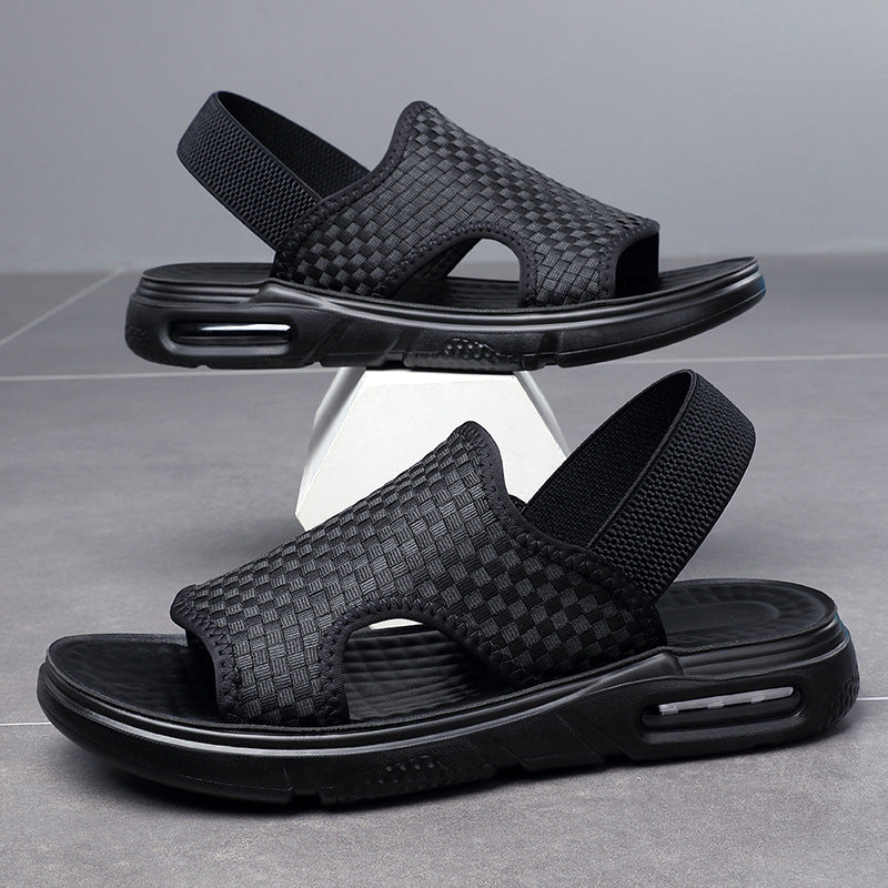 Herr luftiga svarta strandsandaler med elastisk rem, öppen tå och mjuk luftkuddesula för optimal sommarkomfort.