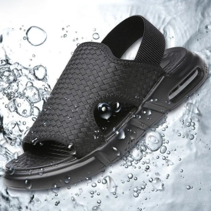 Herr luftiga svarta strandsandaler med elastisk rem, öppen tå och mjuk luftkuddesula för optimal sommarkomfort.