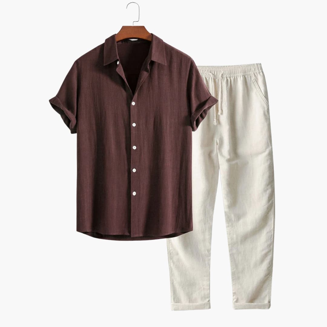 Svart tvådelat herrset: kortärmad casual skjorta och avsmalnande byxor. Perfekt för en snygg sommarstil.
