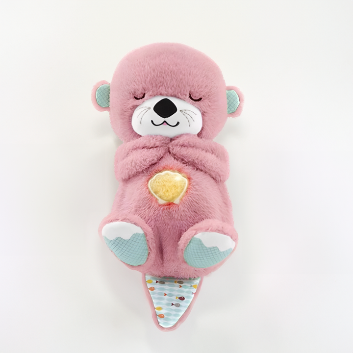 Den rosa varianten av BlissfulBuddy sömnstöd utter sedd framifrån.