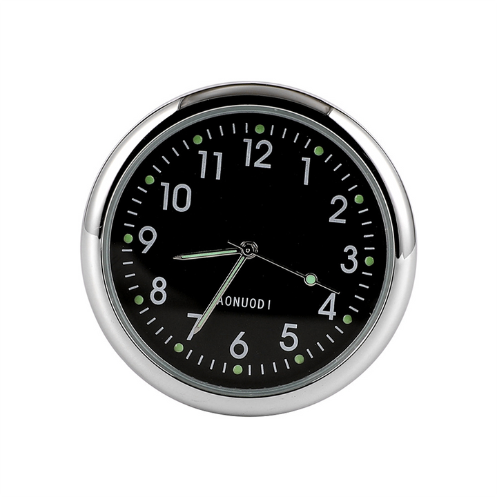 "Mini bilklocka med lysande digital display, rund metall, svart och vit färg, perfekt för stil och funktion i bilen."