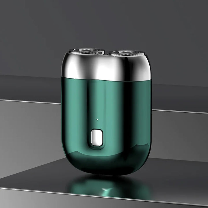 Mini elektrisk rakapparat för män, bärbar, vattentät, kompakt design med rostfria stålblad och elegant finish.