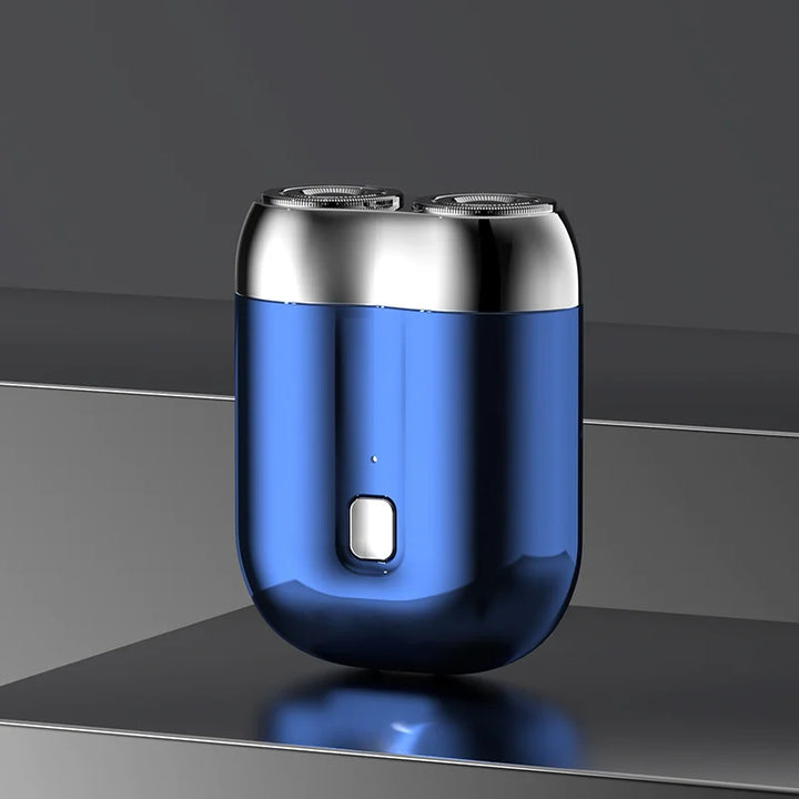 Mini elektrisk rakapparat för män, bärbar, vattentät, kompakt design med rostfria stålblad och elegant finish.