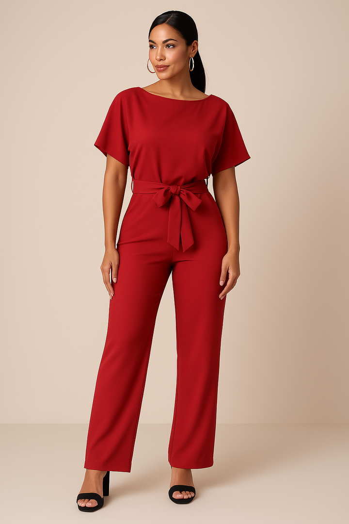 Damjumpsuit med vida ben, knytband och kort ärm. Elegant snitt för en sofistikerad look.