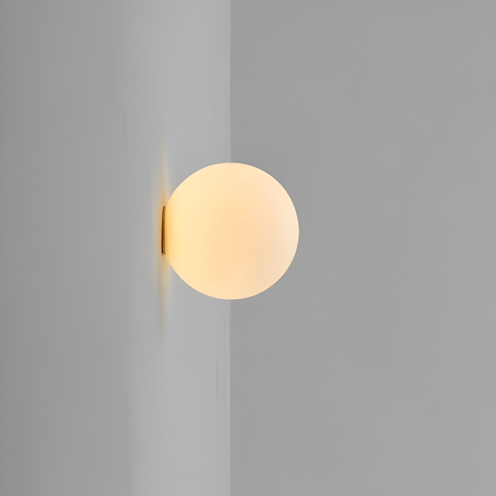 Rund LED-vägglampa för modern heminredning, skapar ett mjukt och inbjudande ljus.