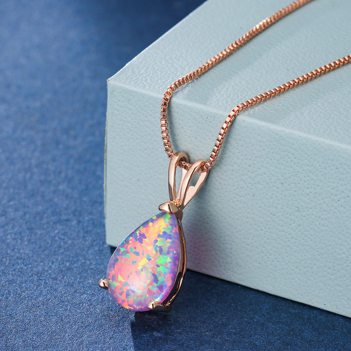 Stilrent dropphalsband med opal i silver, tidlöst smycke.