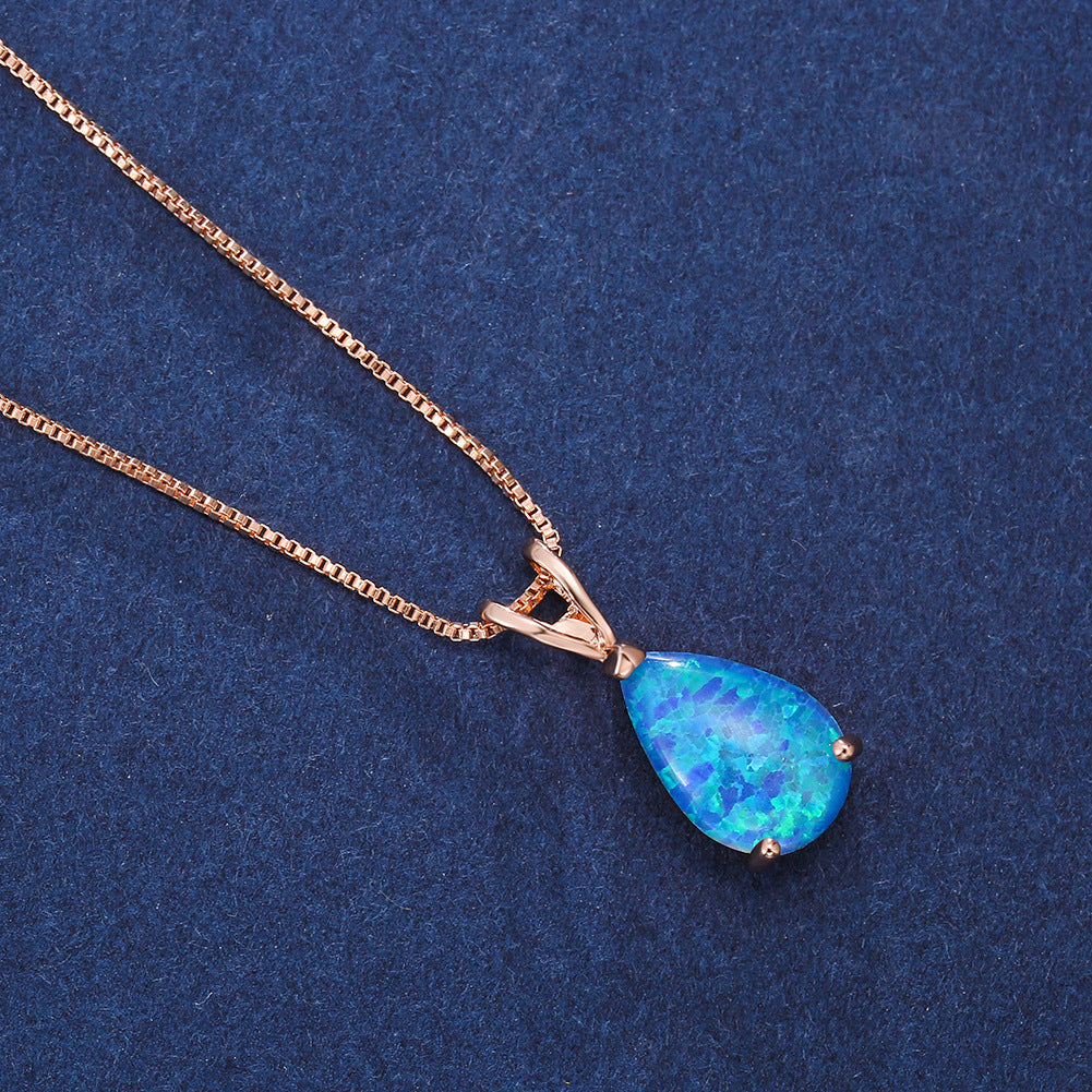 Smycke: Minimalistiskt dropphalsband med opalsten, silver.