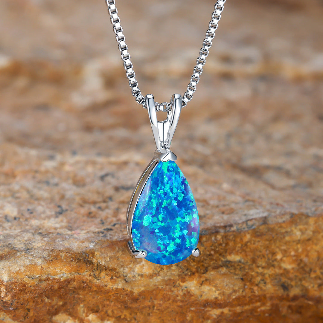 Opalhalsband dam: Minimalistisk design i silver med lysande opal.