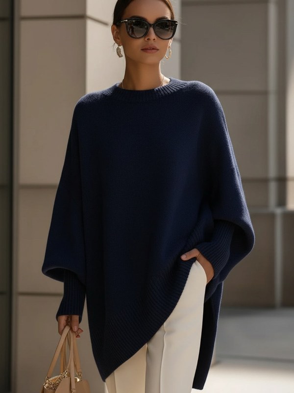 Stickad damponcho, extra mjuk och oversize, perfekt som tröja. Komfortabel & stilfull för vardag.