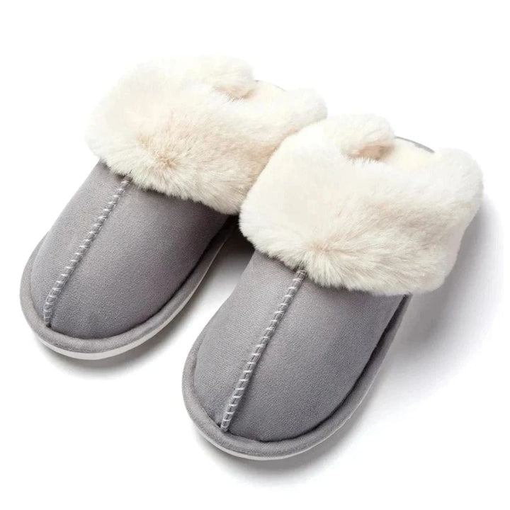 Varmfodrade innetofflor med halkfri sula för trygg komfort hemma. Perfekta unisex tofflor.