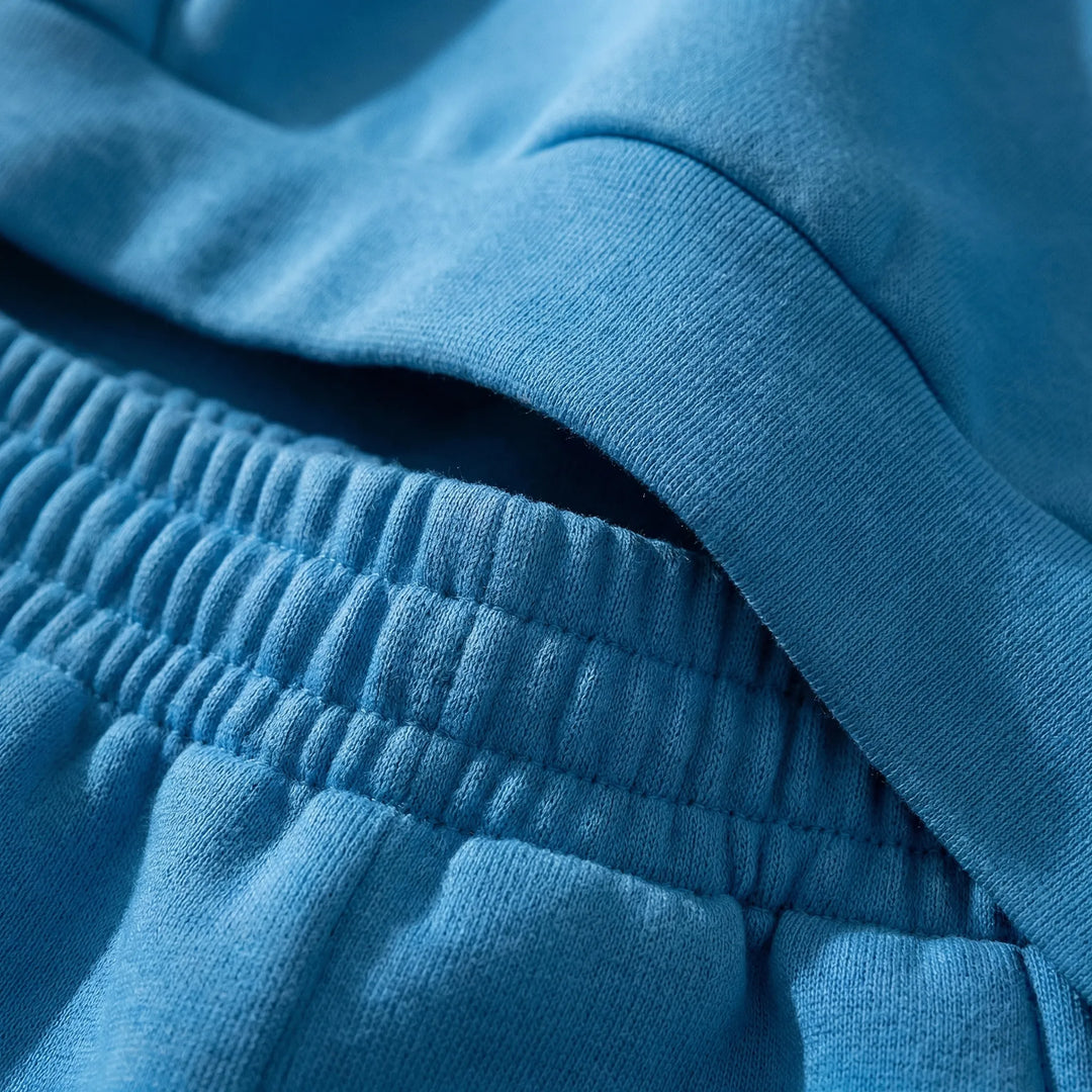 Dam loungewear-set med huva och mjuk passform. Idealisk för mysiga höstkvällar och avkoppling.