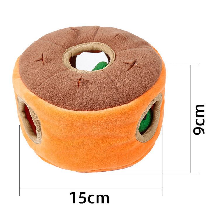 Slitstark hundleksak: Tuggboll i mocka med fjädrar. Stimulerar hundens lek och tuggbehov.