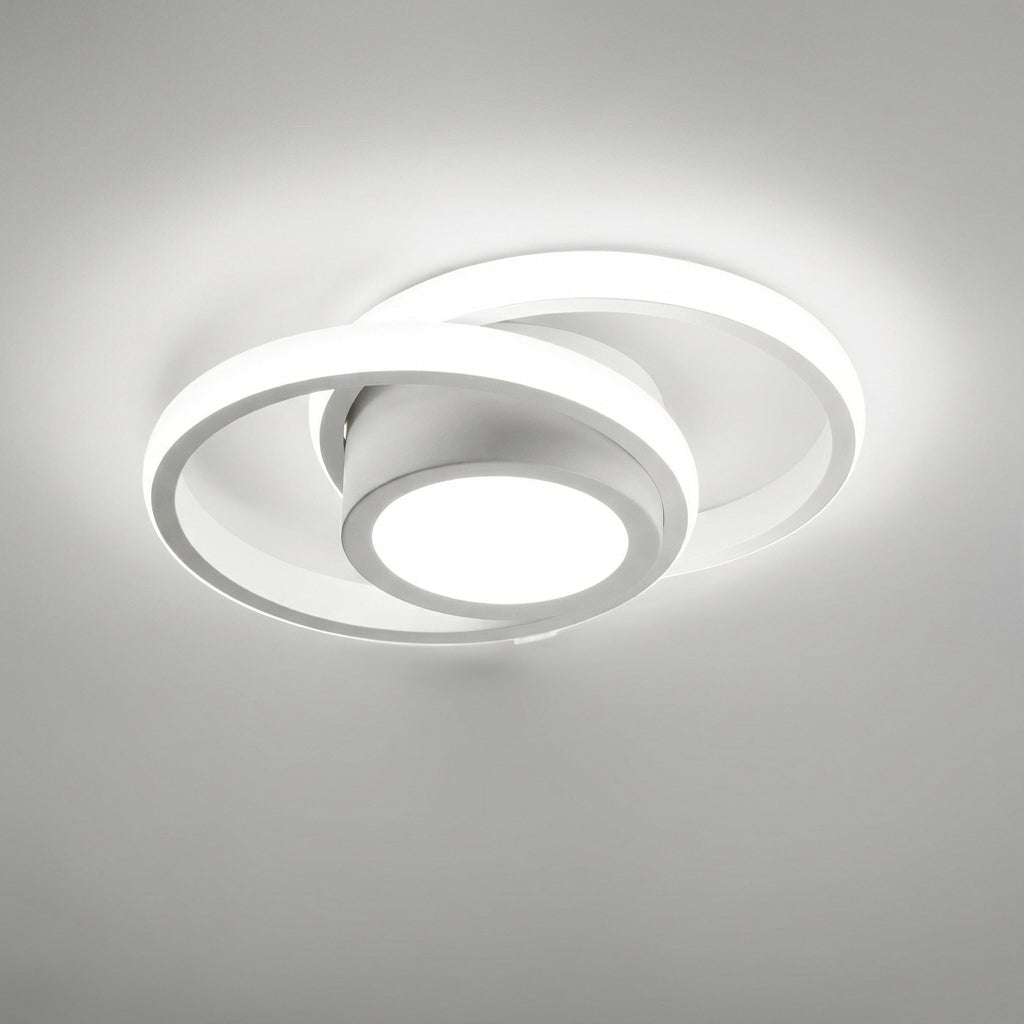 Modern rund vit LED-taklampa monterad i taket