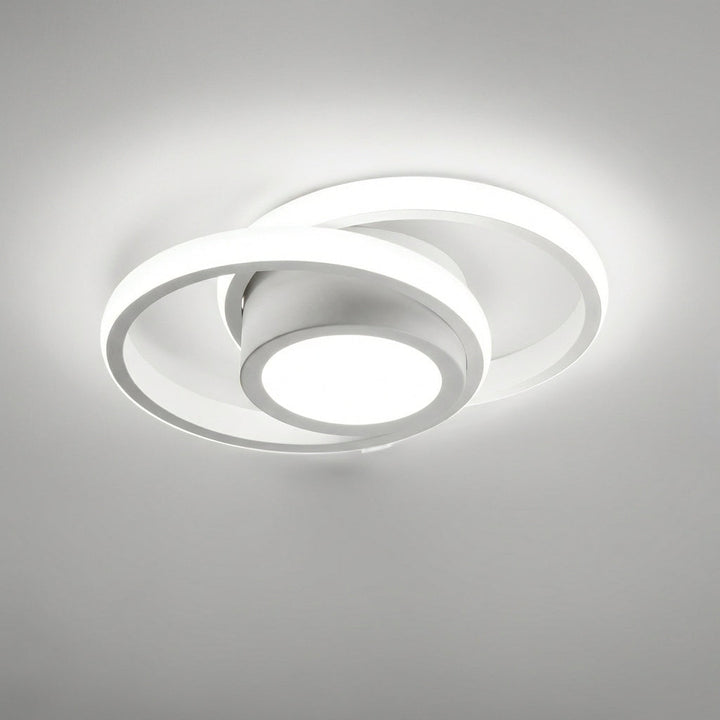 Modern rund vit LED-taklampa monterad i taket