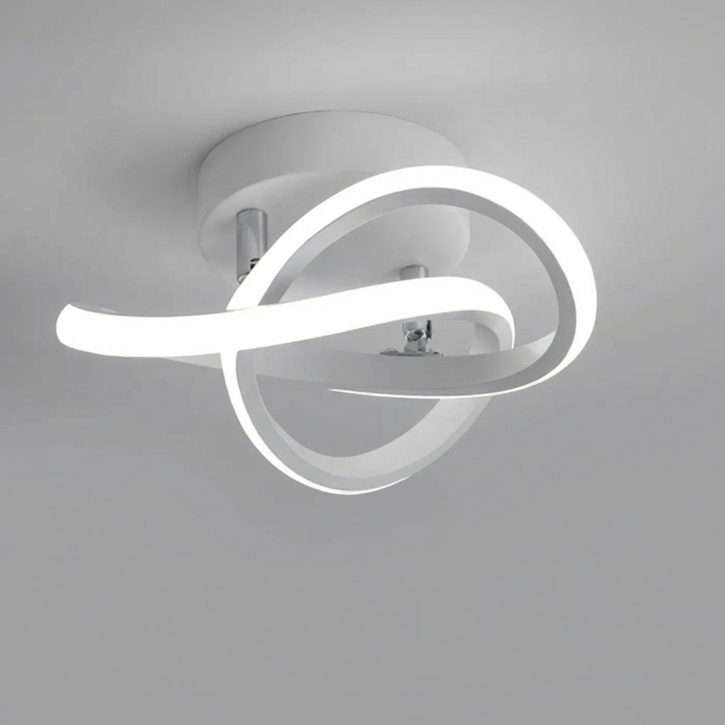 Vågformad vit LED-taklampa som lyser upp rummet