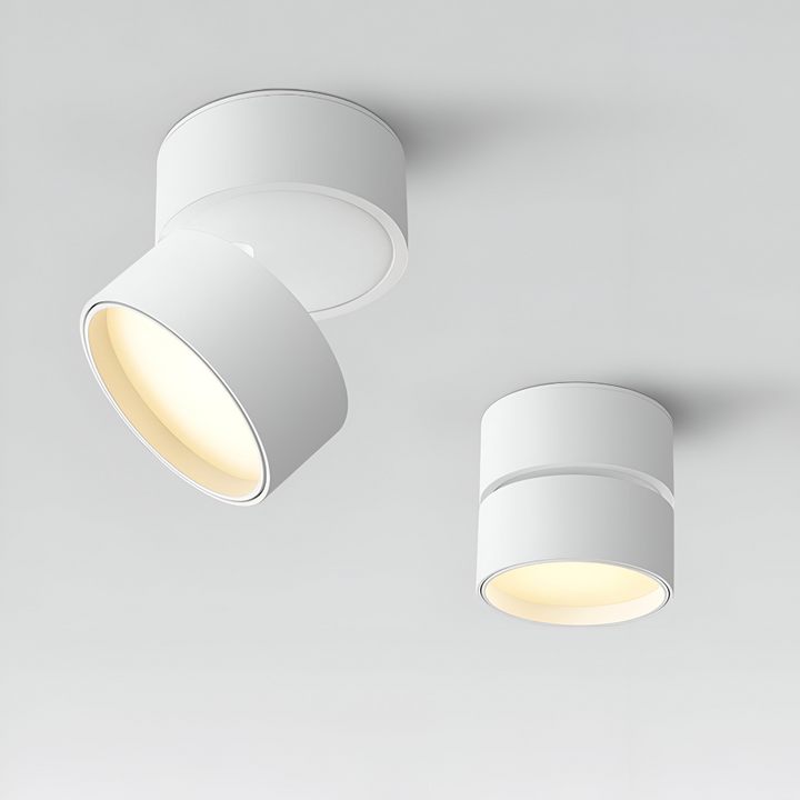 Elegant LED spotlight taklampa för vardagsrummet, skapar en välkomnande atmosfär.