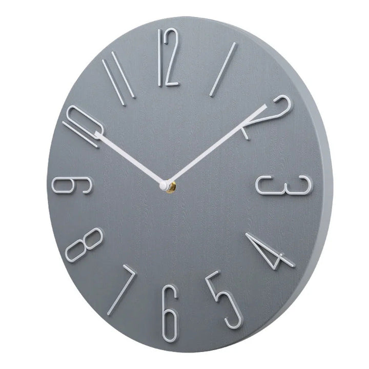 Tystgående väggklocka, minimalistisk design. Skapar lugn och stil i vardagsrum, kontor eller som modern hemdekoration.