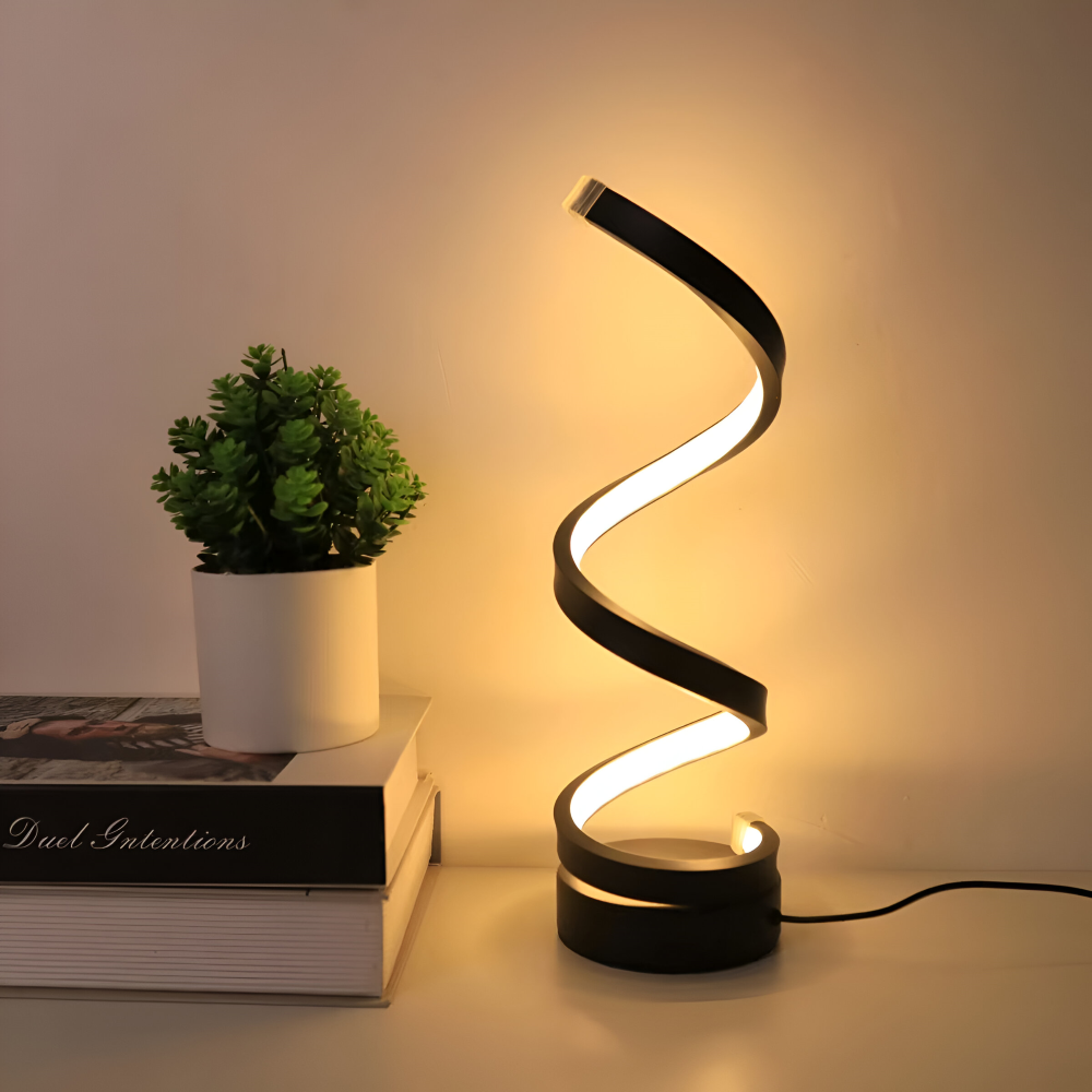 Elegant spiraldesign LED bordslampa, en dimbar designlampa för modern inredning.