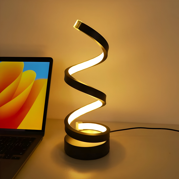 Stilren skrivbordslampa med spiral LED, energismart belysning för ditt hemmakontor och läsning.