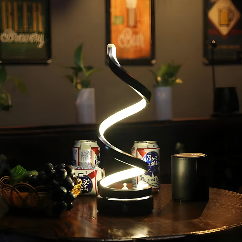 Närbild på spiral LED bordslampa, visar den moderna designen och energismarta ljuskällan.