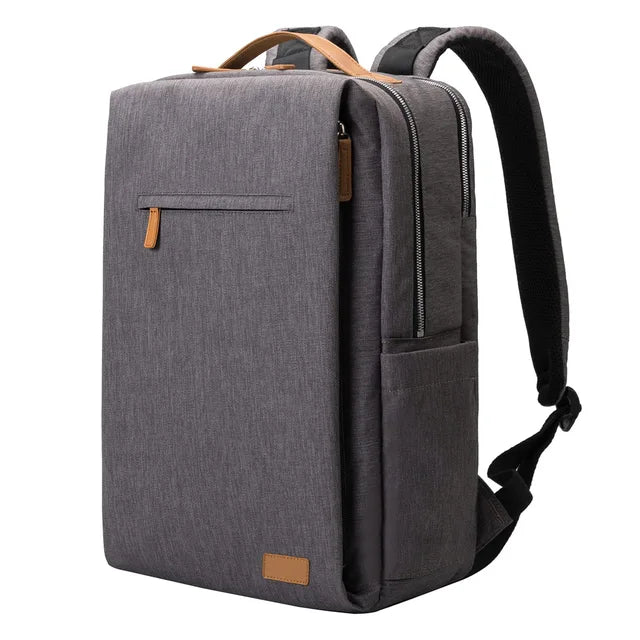 Grå vardagsryggsäck för unisex med organiserat laptopfack & USB-port. Bekväm för pendling.