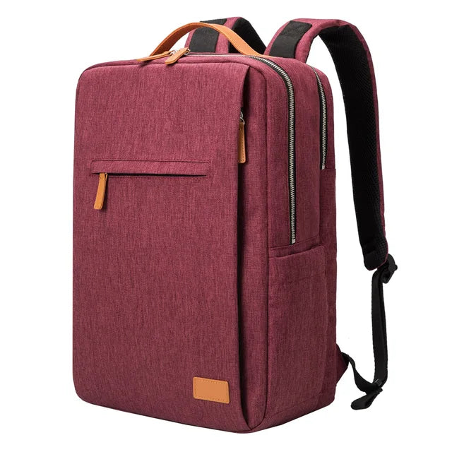 Reseryggsäck unisex med integrerad USB-laddning, rymligt laptopfack. Tillgänglig i röd, svart, beige.