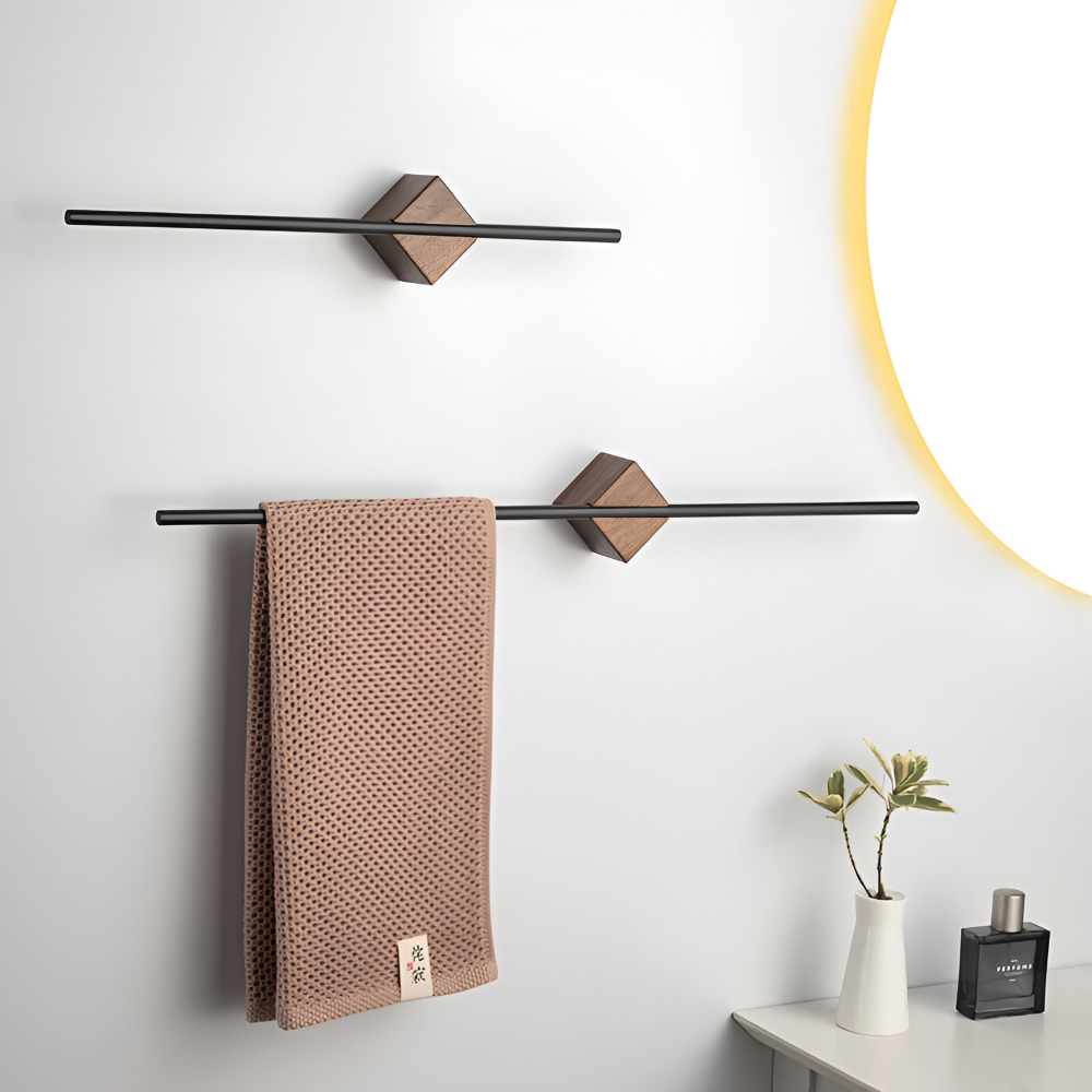 Elegant svart handduksställ i minimalistisk design för badrum & kök.