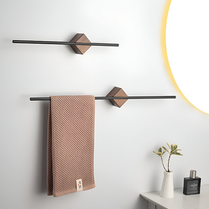 Elegant svart handduksställ i minimalistisk design för badrum & kök.