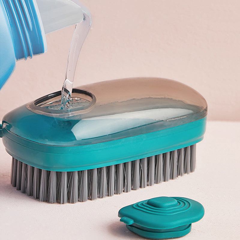 Multifunktionell ergonomisk rengöringsborste i ABS-plast med bekvämt grepp och vätskedispensersystem för köket.