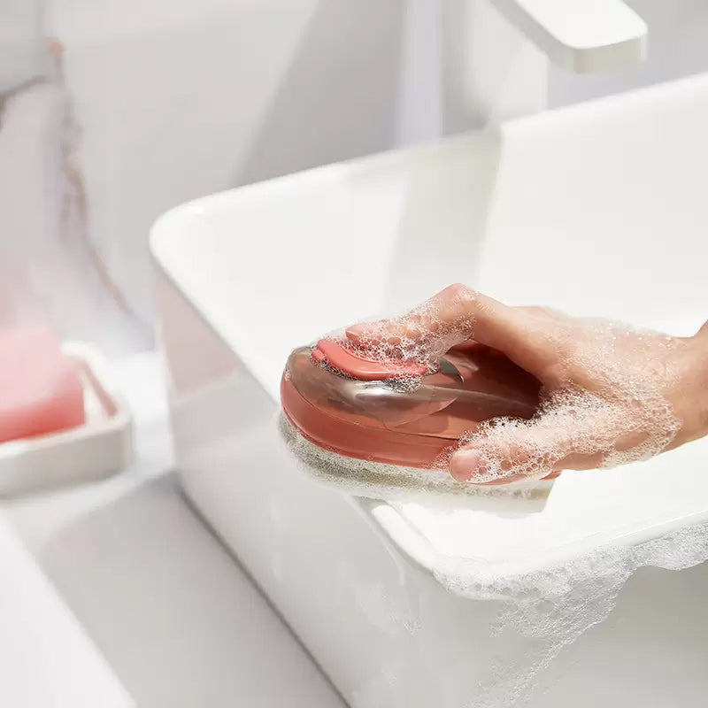 Multifunktionell ergonomisk rengöringsborste i ABS-plast med bekvämt grepp och vätskedispensersystem för köket.