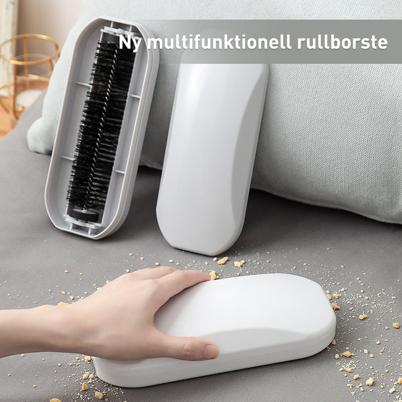 "Multifunktionell ergonomisk rullborste vit/grå, stilren och effektiv för rengöring av olika ytor."