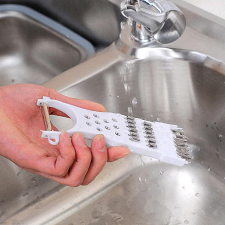 "Multifunktionell köksskalare 5-i-1 med rostfritt stålblad, ergonomisk design, perfekt för skala och skära frukt och grönsake